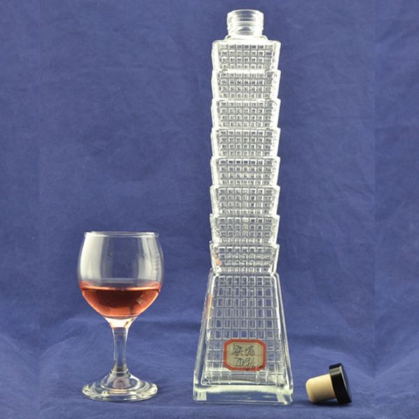 Embossed High Flint Glass Material Eiffel Tower Shape Glass Liquor Bottle with Cork