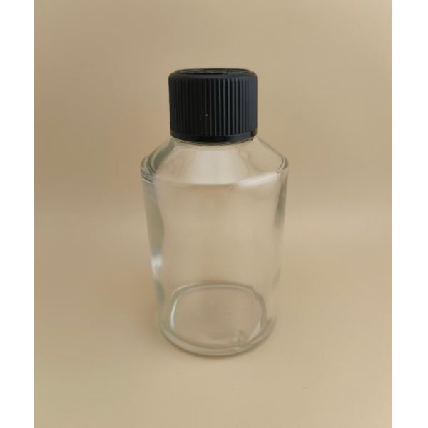 Diseño delicado, botella redonda grande de vidrio transparente y liso con tapa especial para medicamento