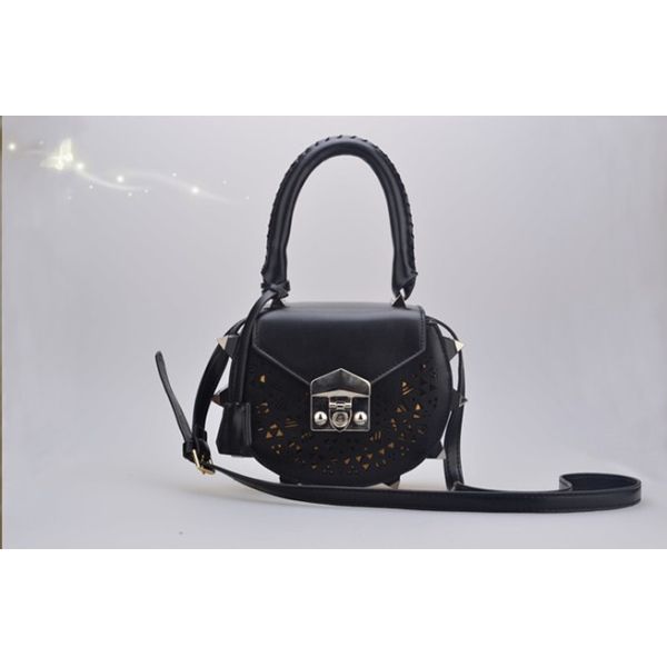 2016 Korean version of the new shoulder bag female fashion rivets hollow pattern portable diagonal package