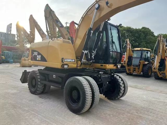 Колесный экскаватор CatM315D Отличная производительность и множество практических функций