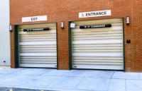 A porta variável da espiral da velocidade industrial rola acima a liga de alumínio da garagem com isolação da espuma