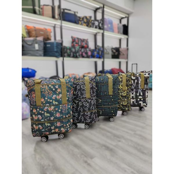 Fabricants Vente directe Sac de voyage à roues pliable de grande capacité durable pour l'extérieur