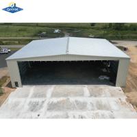 Estruturas espaciais de aço pré-fabricadas Hangares de aeronaves personalizados com porta de elevação