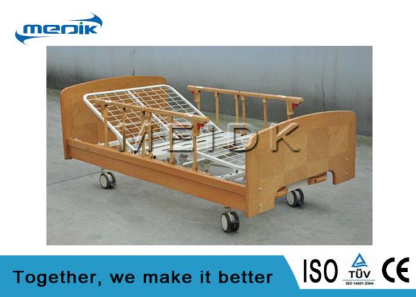Two Manual Crank Nursing Home Beds Solid Wood Structure Aluminum Alloy Side Rail