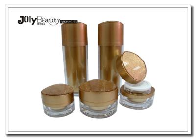 A Stamped Printed Empty Cosmetic Bottles Golden Colored Cream Jars