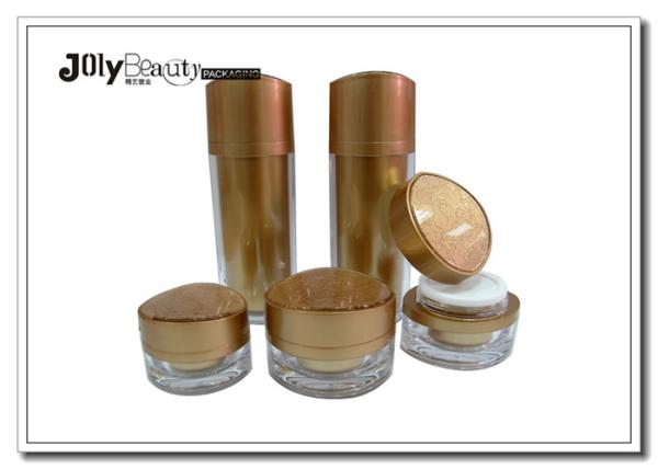 A Stamped Printed Empty Cosmetic Bottles Golden Colored Cream Jars