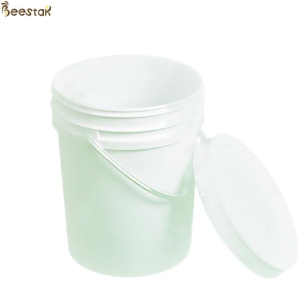 Tanque de mel de plástico amarelo branco com porta de mel para armazenamento de mel