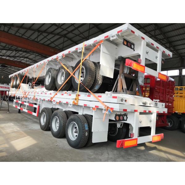 Customizable Flat Bed Semi Trailer with 40-60t Load Capacity, High-strength Steel Construction, and 3 Axles for Heavy-Duty Transport