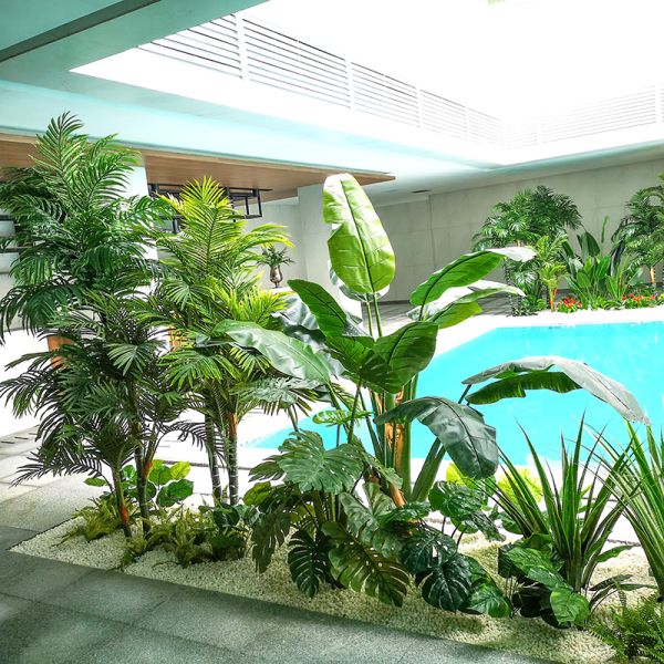 Зеленые в горшке крытые орнаменты места отдыха ландшафта угла ладони путешественников