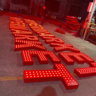 Do shopping do gigante da luz espessura dos sinais 10cm da letra acima