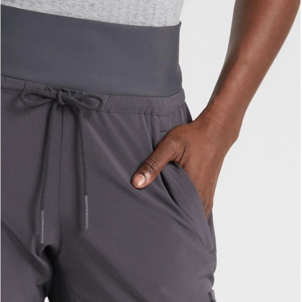 Нежность вяжет ткань простирания брюк Joggers Sportswear женщин облегченную