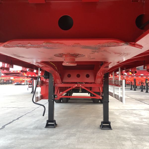 Hot 4 Axles Flatbed Semi Trailer with 1000mm Sidewall Max Payload of 60T 12.00R20 Tire