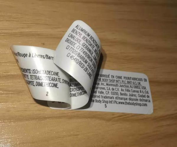 Adesivo transparente anti-falsificação