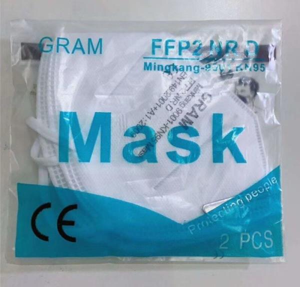 Máscara FFP2 com os produtos dos cuidados pessoais do certificado do CE para protetor médico em Coronavirus