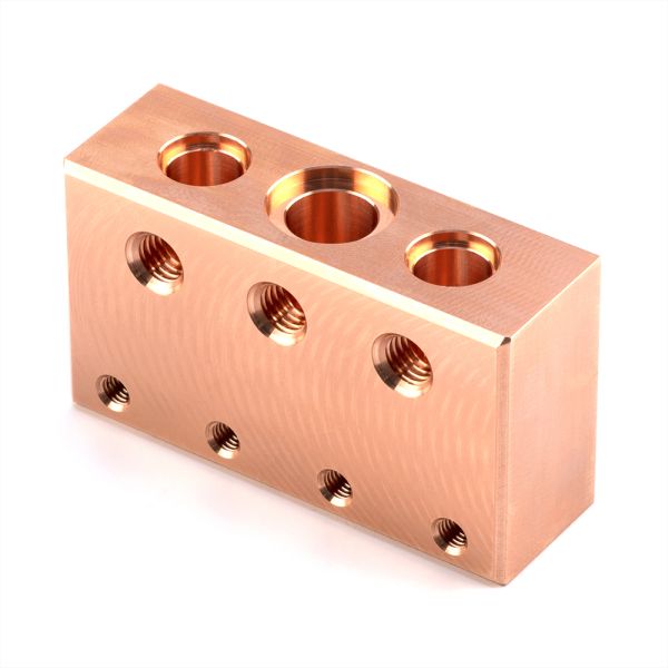 Custom hydraulic valve blocks red copper and brass manifolds, adaptable to various hydraulic equipment