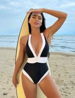 Un maillot de bain en une pièce avec une épaisseur moyenne en spandex et un maillot de bain en une pièce