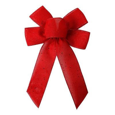Handmade burlap ribbon bow for creating festive and beautiful Christmas wreaths