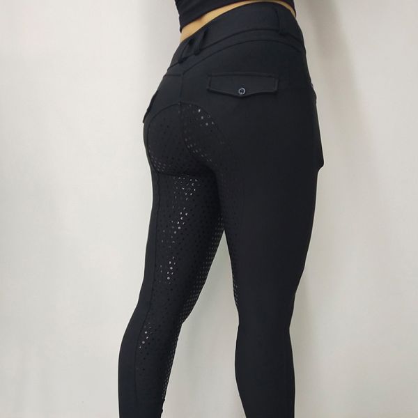 Женщина ехать бриджей Waisted обжатия высокая полная усаживает черные конноспортивные гетры