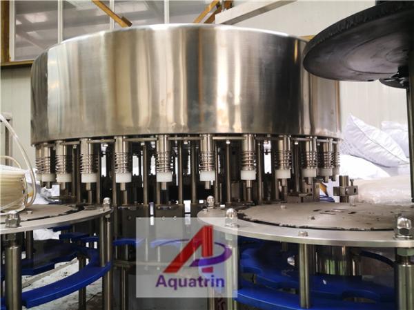Automatic Rotary 3 In 1 PET Plastic Bottled Water Filling Machine For Purified Pure Mineral Spring Drinking Water