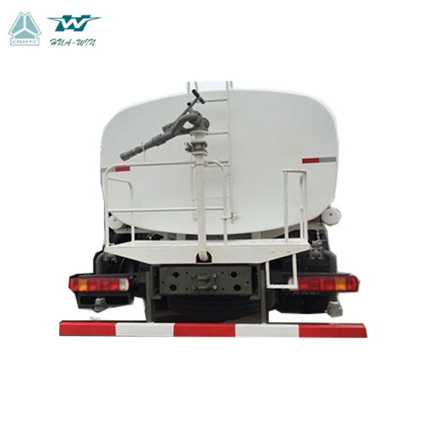 Sinotruk Howo 6X4 6000Gallon 2 spray heads remote control watering spray tanker truck with pump
