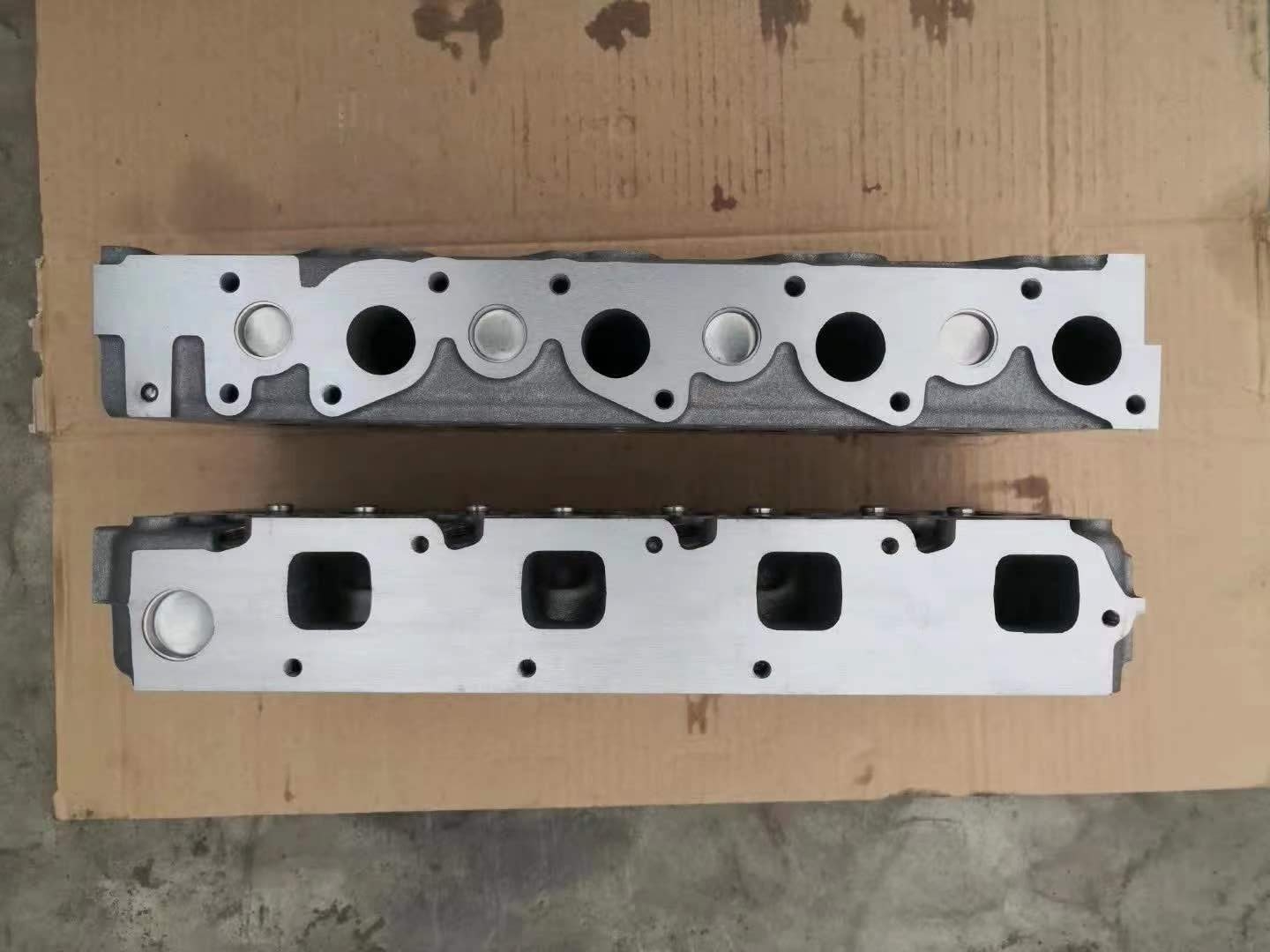 Головка цилиндра двигателя Kubota V2203 V2203-M 01907-703040 1907-703048