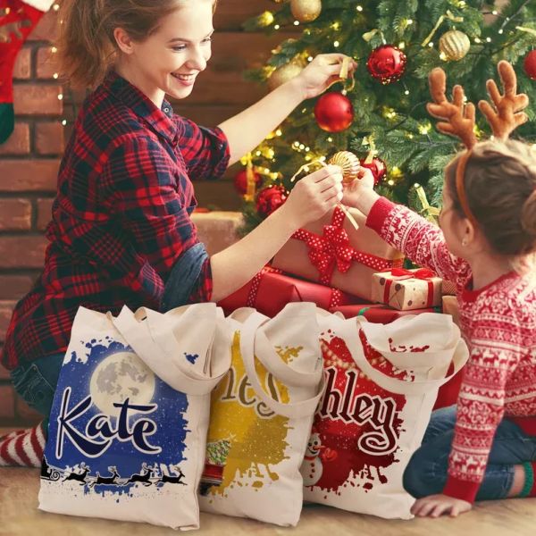Подарок Tote рождества многоразовый кладет материал в мешки холста износоустойчивый