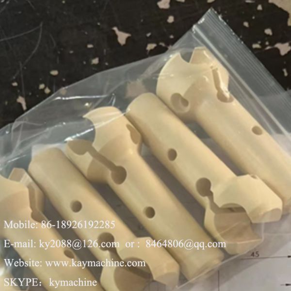 CNC precision machining of PEEK special-shaped parts PEEK natural color parts turning of valve plate parts, PEEK products CNC turning of PEEK multi way valve chemical parts China manufacturer factory