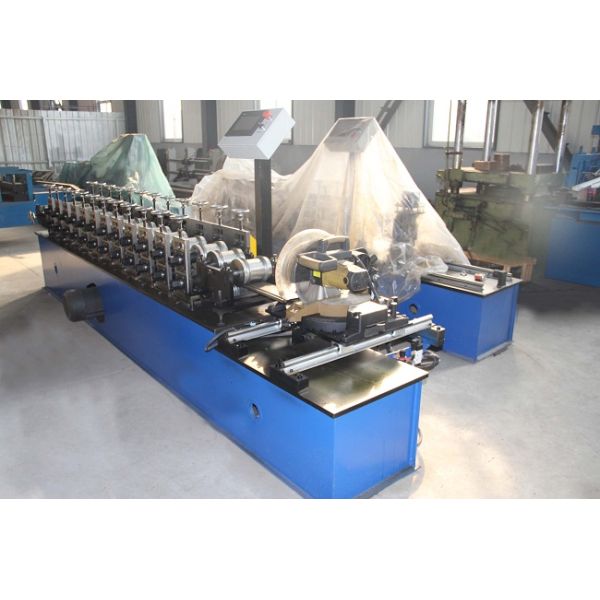 Aluminum Steel Roller Shutter Door Roll Forming Machine FX98 With Fly Saw