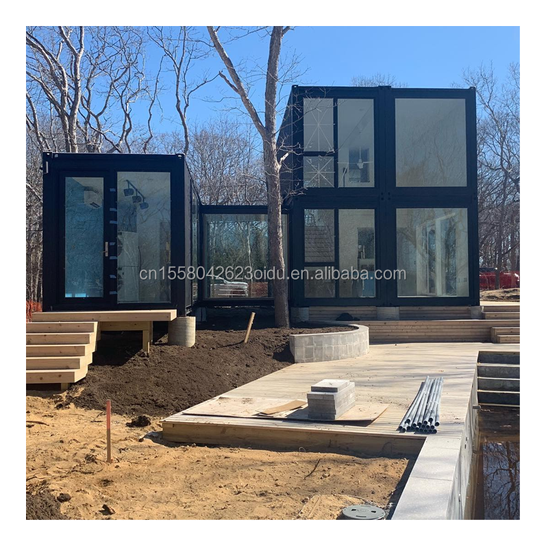 Casa de contenedores prefabricada residencial de 20 pies con pared de vidrio Villa de oficina y montaje de paquete plano de dos pisos