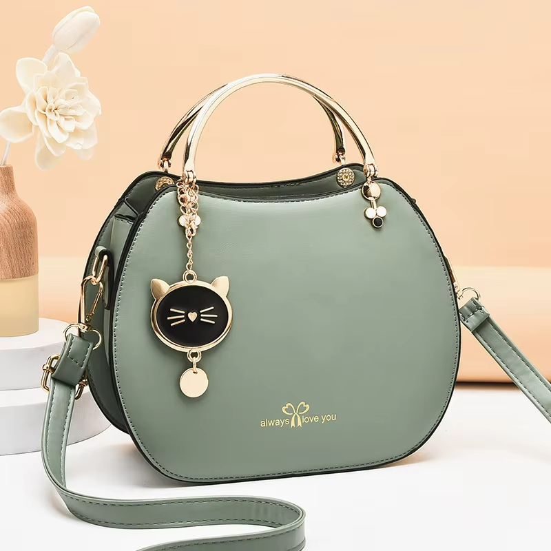 Trendy Single Shoulder Women's Handbag with Cat Pendant and Zipper Closure
