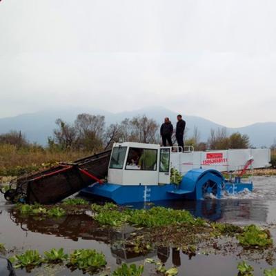 A espumadeira do lixo das estações de tratamento de água 12cbm da grama do lago faz à máquina o barco da limpeza do rio da lagoa