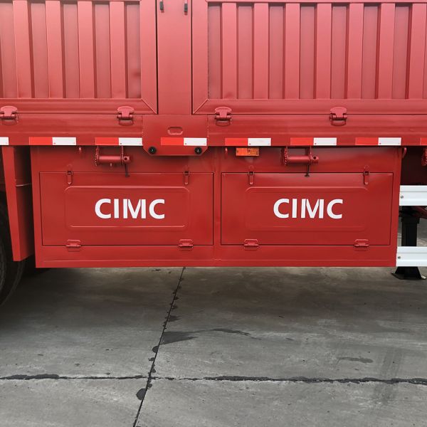 Hot 4 Axles Flatbed Semi Trailer with 1000mm Sidewall Max Payload of 60T 12.00R20 Tire