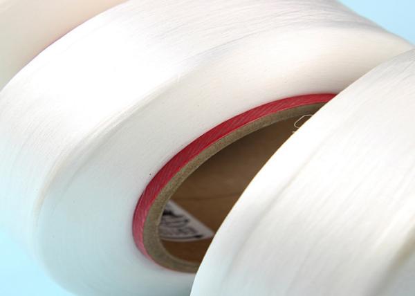 O Spandex branco cru cobriu o fio 40D para cobrir a confecção de malhas/que tece, uniformidade alta