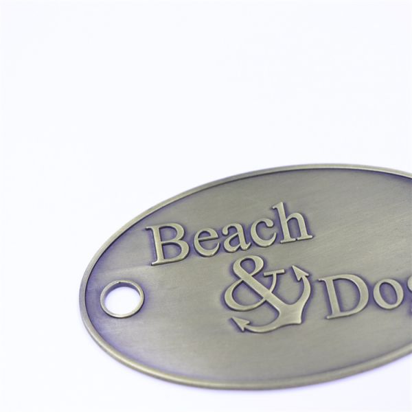 Customized Zinc Alloy Nameplate Metal Oval Name Plate With Embossed Font Beach Logo