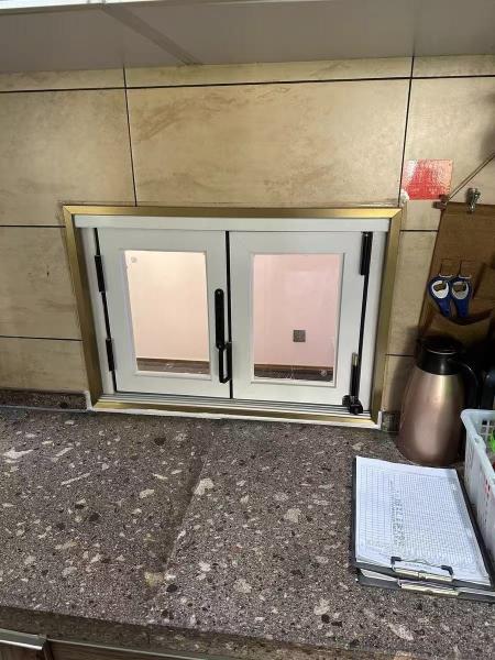 Structural Silicone Glazed Folding Windows - Flush Glass Appearance