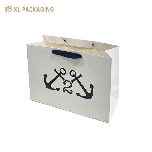 XL Packaging Custom Packaging Factory White Paper Packaging Bags Gold Foil Kraft Paper Clothes Shoes Shopping Bag With Handle
