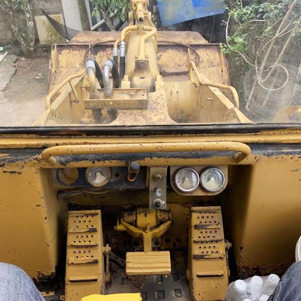 Использованная загрузчица Cat 963 с рельсовым погрузчиком