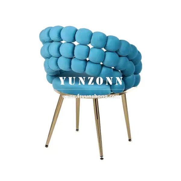 Wholesale Modern Style Gold Metal Legs Hotel Armchair Upholstered Beige Velvet Fabric Pompom Dining Chair