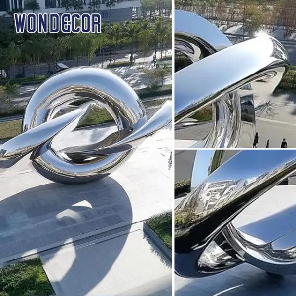 Абстрактная скульптура кольца из нержавеющей стали современной городской уличной архитектуры