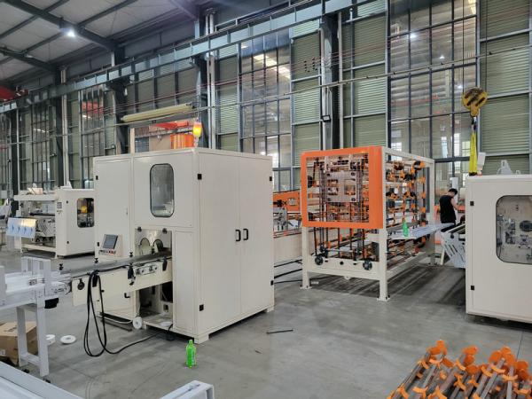 PLC制御ルーマニア高速ラミネーション小型トイレットペーパーロール製造カラー印刷キッチンタオル機生産ライン