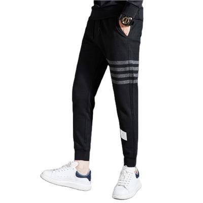 Dos homens populares elásticos do Sportswear da cintura do poliéster do Spandex basculadores aptos magros