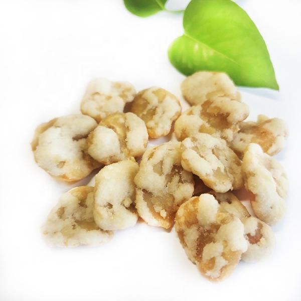 Хрустящий вкус меда и масла покрыл зажаренную широкую фасоль откалывает закуски