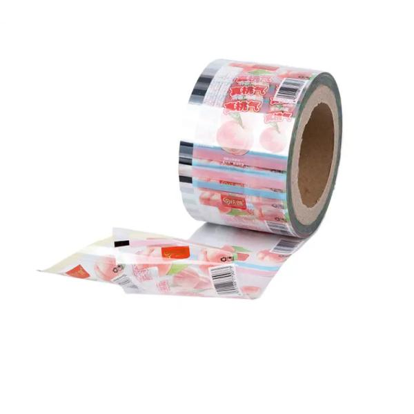 Impresión a medida Bolsas de embalaje película de rollo de calidad alimentaria Pe Bopp Dulces Lollipop Chocolate Alimentos de embalaje automático película de rollo