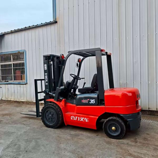 Second-Hand Heli 3.5 Ton 3-Mast Manual Forklift, High-Strength Steel Frame, Orange Color, Perfect for Heavy-Duty Material Handling in Industrial and Logistics Environments