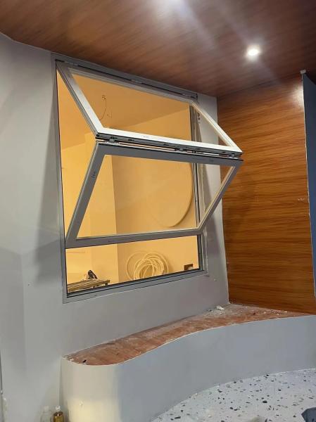 Durable Core Folding Window Construction Utilizing Composite Materials for Low Lifetime Maintenance
