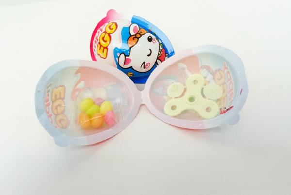 Feijão de geleia dos doces do sabor do fruto de Toy Egg Candy Happy Egg multi com os doces bonitos de Mini Spinner Toy