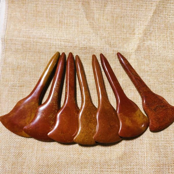 Experience the Healing Benefits of Full-body Massage and Acupoint Stimulation with Red Bian Stone Gua Sha Board