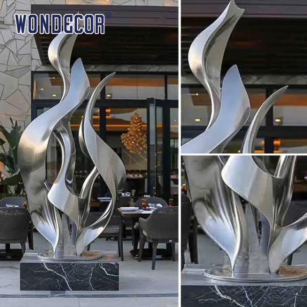 Large outdoor hotel gate forged metal abstract ribbon stainless steel sculpture