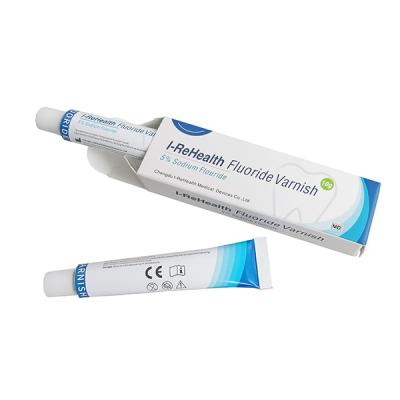 o verniz do fluoreto 10g impede a deterioração de dente e a desmineralização das crianças do deleite com CE