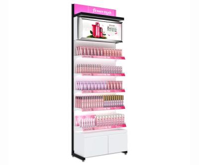 Armário e mostra cosméticos de exposição das várias cores para o shopping